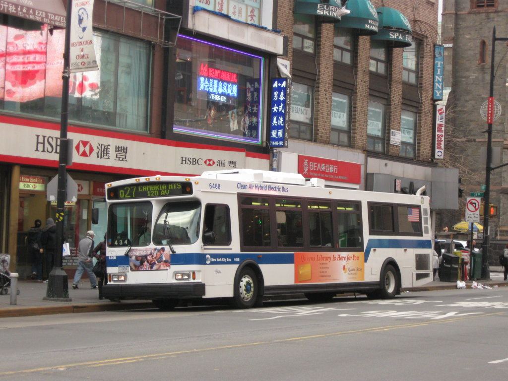 City Buses Get Priority Lanes on the Busiest Corridors city bus carrying passengers along a busy street