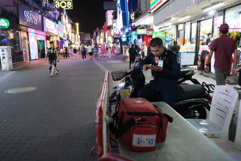 High Streets Test Late-Night Shopping to Lift Footfall shoppers walking along a busy retail street
