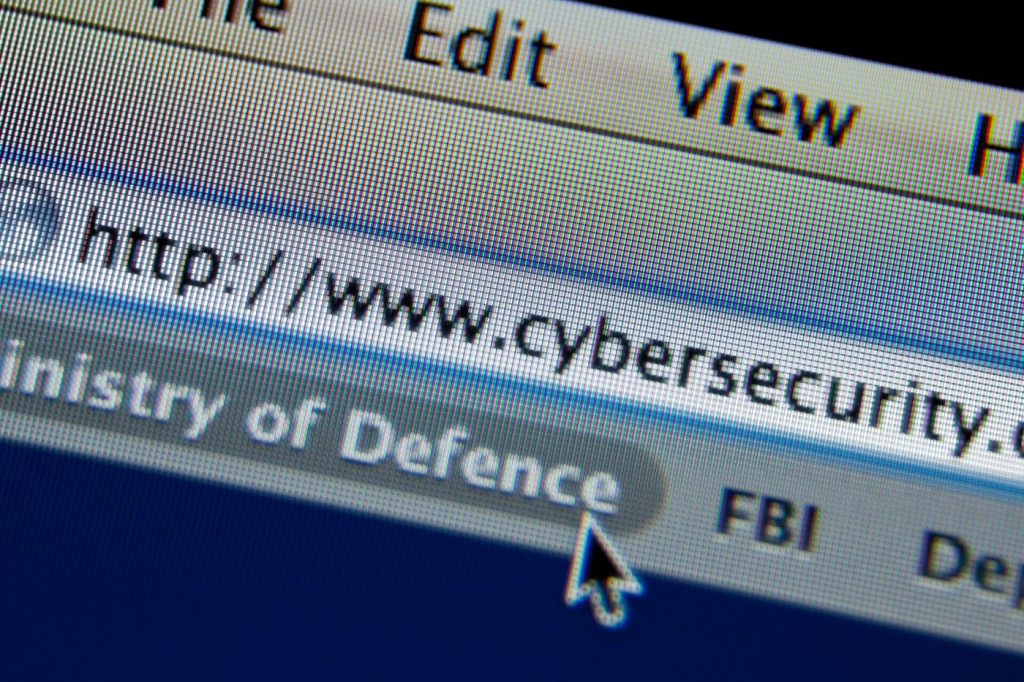 analysts monitoring screens in a security operations centre